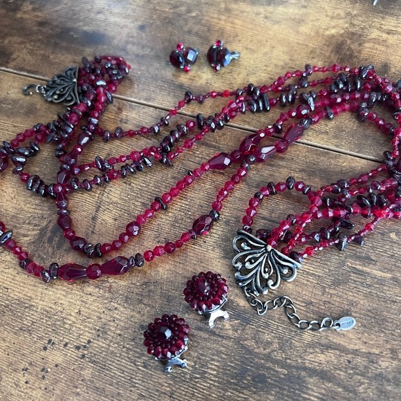 Vintage Garnet necklace and two sets of beautiful clip-on earrings.